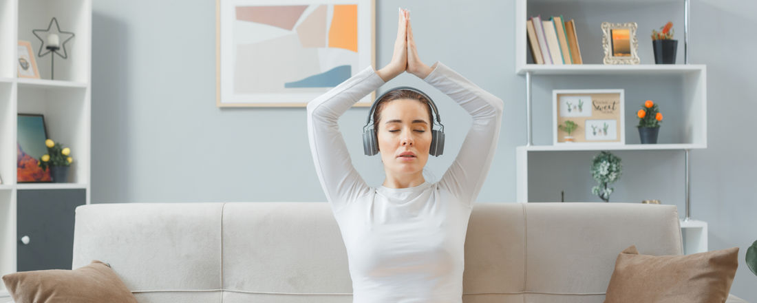 Person in a peaceful setting practicing breathwork techniques for stress reduction, highlighting the calming effect of controlled breathing.