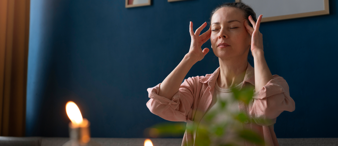 Woman practicing yoga to manage migraine as part of a holistic headache treatment strategy