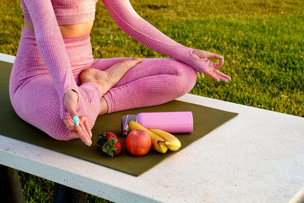  Person practicing yoga with anti-inflammatory foods and supplements for pain relief