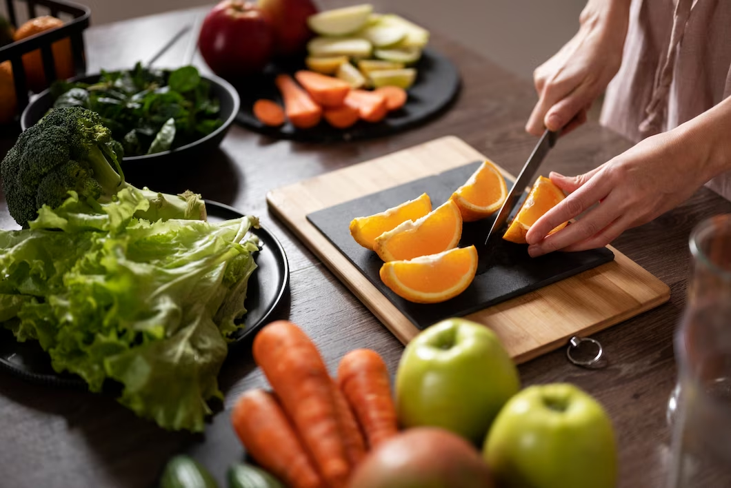 Strengthen your immune system with healthy habits: Person enjoying plate of fruits and vegetables surrounded by vibrant natural elements.