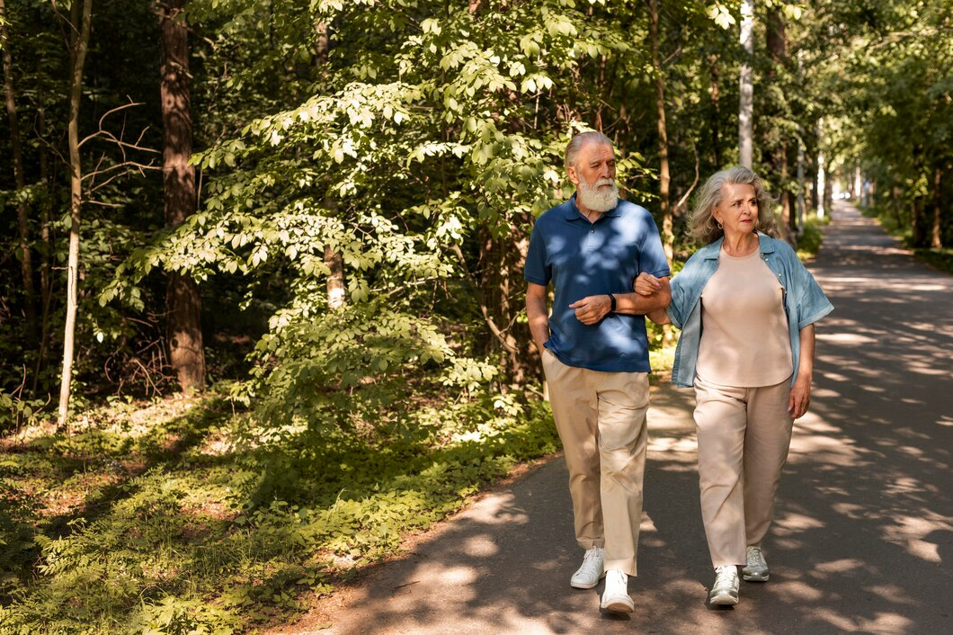 Middle-aged couple enjoying a morning jog in the park.